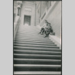 David, Chester Jr., Gerald and Norman Sakura sitting on steps of Wisconsin State Capitol Building (ddr-densho-523-225)