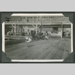Men relaxing around pier (ddr-densho-540-42)
