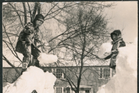 David, Chester and Gerald Sakura playing in deep snow (ddr-densho-523-196)