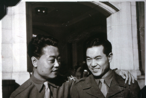 Two men in front of archway (ddr-densho-1007-706)
