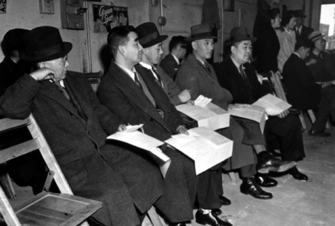 Japanese Americans registering for mass removal (ddr-densho-36-49)