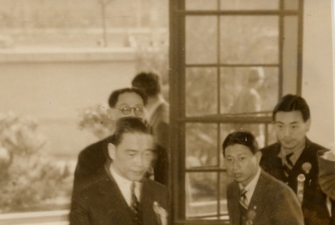 Wang Jingmei entering a building (ddr-njpa-1-1032)