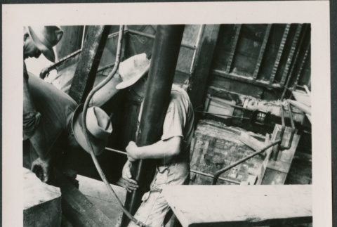 Men setting support post (ddr-densho-426-2259)