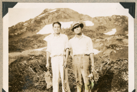 Two men after hunting (ddr-densho-383-56)
