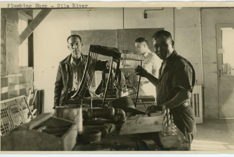 Men in the plumbing shop (ddr-densho-37-2157)