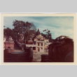 Shrine with stairs, man in foreground (ddr-densho-426-1135)