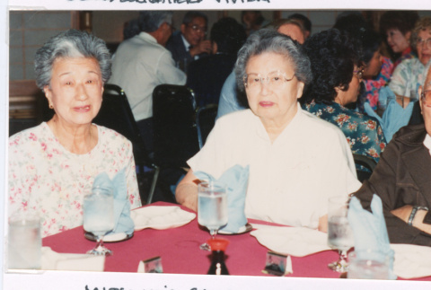 Takeo and Mitzi Isoshima at dinner with Helen Shimizu (ddr-densho-477-525)