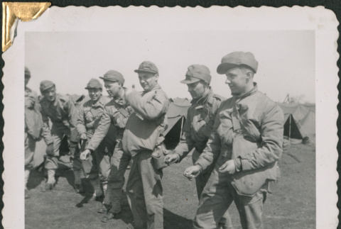 Line of men playing a game (ddr-densho-434-88)