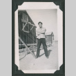Man standing with arms crossed (ddr-densho-471-50)
