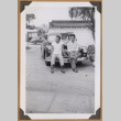 Gary Kikawa and a man on a car bumper (ddr-densho-542-78)