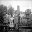 Group standing by stones in cemetery (ddr-densho-426-2471)