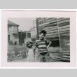John and Jerry Shigaki in yard (ddr-densho-456-14)