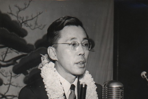 Masahide Kanayama speaking into microphones (ddr-njpa-4-624)