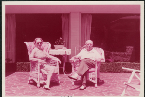 Man and woman on patio (ddr-densho-359-1160)