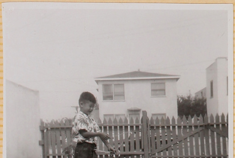 William Shiomi with boy pretending to be shot by an arrow (ddr-densho-522-285)