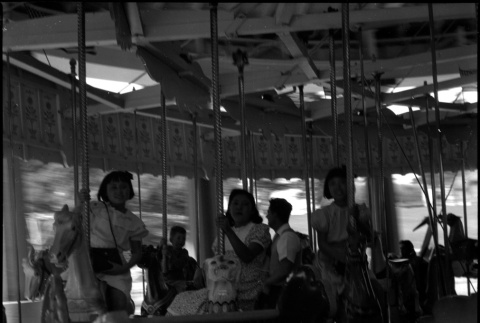Children on merry-go-round (ddr-densho-426-964)