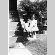 Linda and Susan Yano in front of the White house, Tak and Kiyo's home (ddr-densho-354-58)