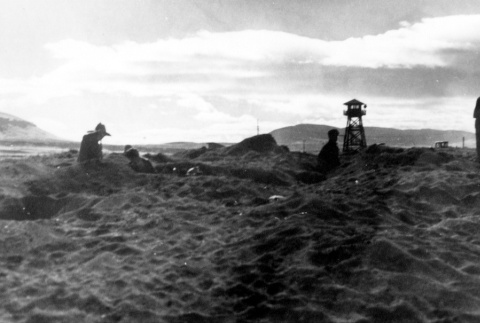 Japanese Americans digging for shells (ddr-densho-2-47)