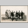 Group standing by grave (ddr-densho-293-125)