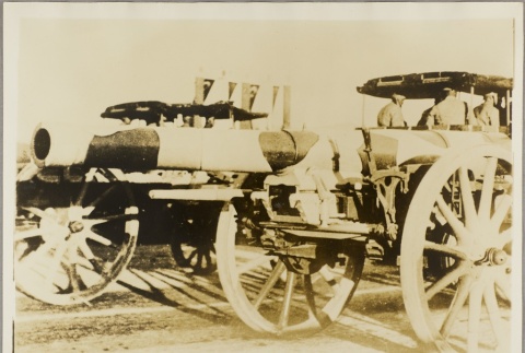 Turkish soldiers riding in wagons towing cannons (ddr-njpa-13-1103)
