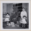 William, Susan and Leslie Shiomi by Christmas tree (ddr-densho-522-527)
