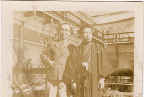 Two men outside Japanese Pavilion at the Golden Gate International Exposition (ddr-densho-426-1989)