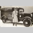Japanese American man in front of car (ddr-densho-128-12)