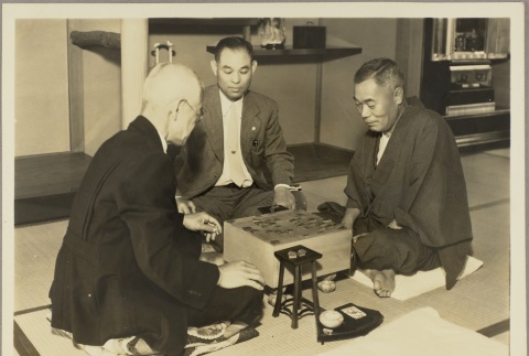 Three men playing go (ddr-njpa-5-1339)