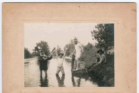 Four men fishing (ddr-densho-546-6)