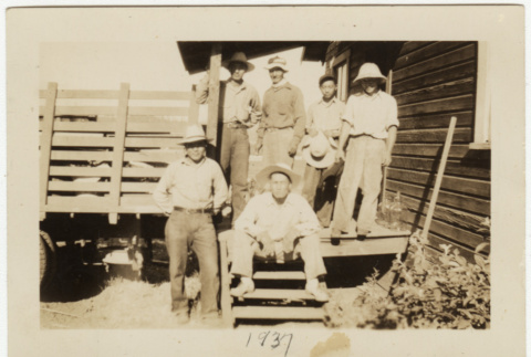 Six men on porch (ddr-densho-388-23)
