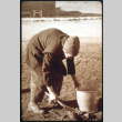 Filling bucket (ddr-densho-1007-662)