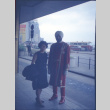 Martha (Nozawa) Tsuchida standing with man in traditional costume (ddr-densho-426-751)