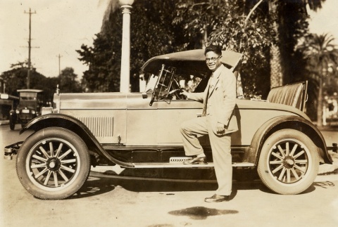 Man posing with car (ddr-njpa-2-981)