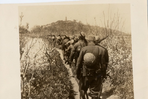 Soldiers walking on a trail (ddr-njpa-6-60)