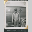 Man standing next to Army medical truck (ddr-densho-434-38)