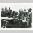 Servicepeople and military vehicle (ddr-densho-1007-169)