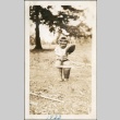 Moss Fujii in a baseball catcher uniform (ddr-densho-321-694)