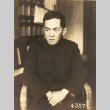 Man seated in a chair (ddr-njpa-4-2026)