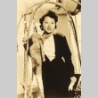 Woman posing for a photograph (ddr-njpa-4-2258)