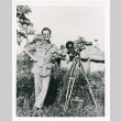 David Quaid with video camera (ddr-densho-1007-333)