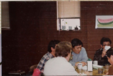 Six people at a table (ddr-densho-426-1259)