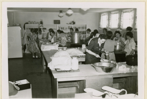 Preparing lunch in a home economics kitchen (ddr-densho-37-1122)