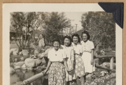 Four women on a bridge (ddr-densho-542-263)