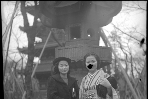 Two women standing in front of shrine (ddr-densho-426-293)